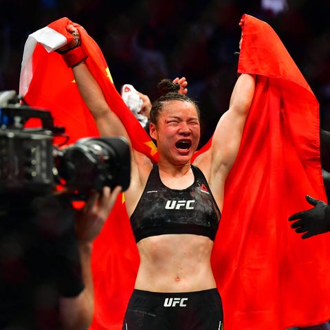 Zhang Weili celebrates her win over Joanna Jedrzej