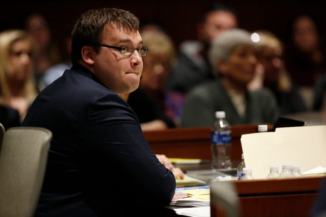 John Austin Hopkins looks toward the jury box during opening statements for his trial at the Warren County Common Pleas Court in Lebanon in 2020. Hopkins, a former gym teacher, was found guilty of inappropriate contact with 28 of his first-grade students.