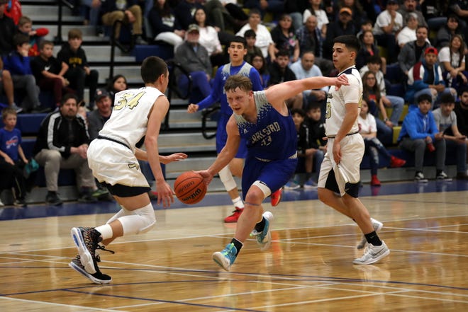 Highlights from Carlsbad's 5A state opening round match against Santa Fe High on March 7, 2020. Santa Fe won,  59-45.