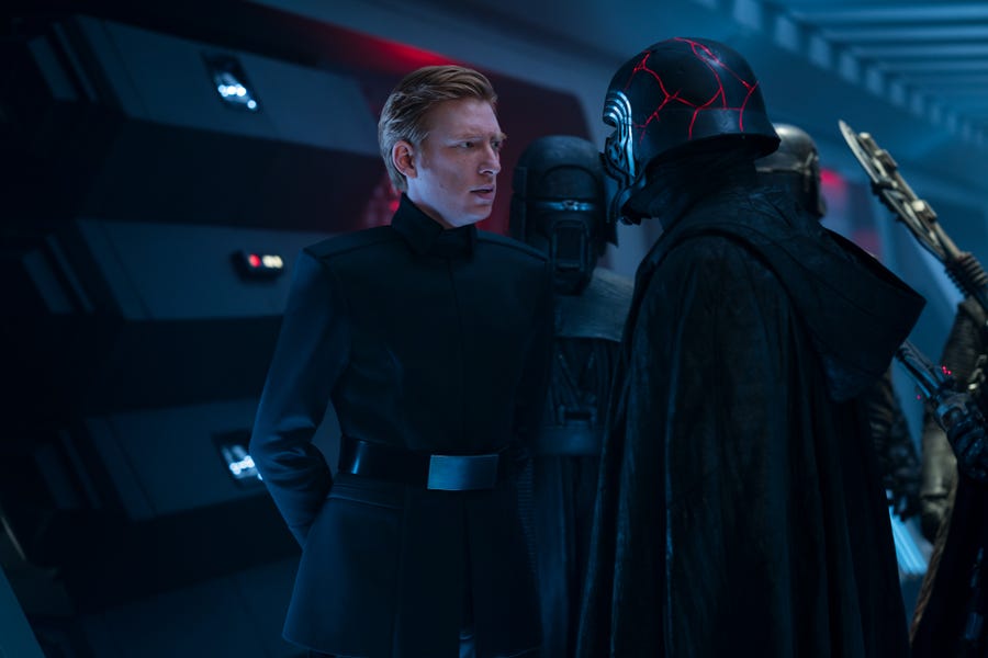 General Hux (Domhnall Gleeson, left) and Kylo Ren (Adam Driver) have words on board a First Order Star Destroyer in "Star Wars: The Rise of Skywalker."