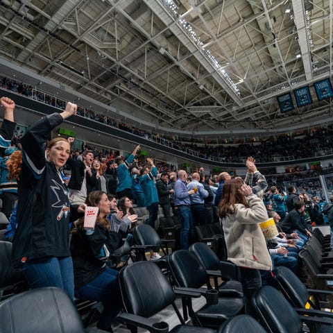 San Jose Sharks fans celebrate after a goal during