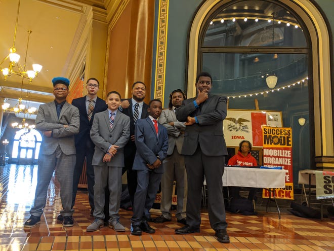 Participants in Des Moines nonprofit Hip-Hope's Executive MOLD program and its founder pose after giving speeches at the Iowa State Capitol in January 2020. The young men, middle and high schoolers in Des Moines and West Des Moines schools, spoke to hundreds about issues important to them. From left: Poet Bell, Solace Robinson, Floyd Ewing, Bo James (Hip-Hope's founder), DeShawn Smith Jr., and  Kalani Bell.
