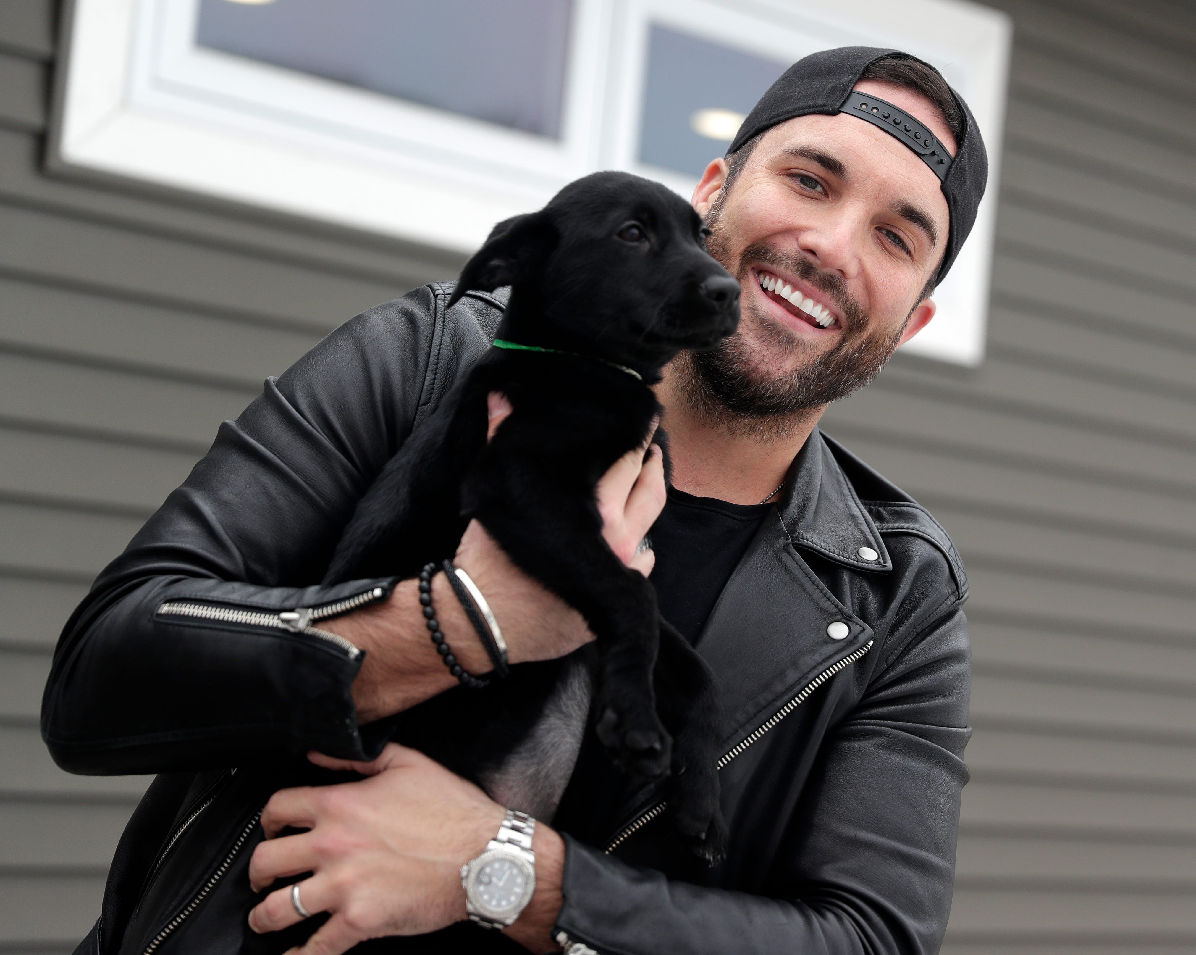 Tyler Rich finds puppy love at Happily Ever After visit, tours Lambeau Field