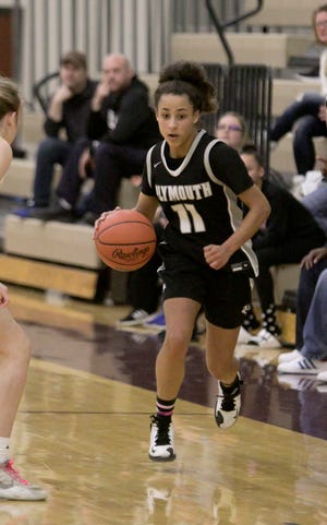 Plymouth Wildcat Kyra Brandon moves the ball in the semifinal game against Brighton Tuesday, March 10, 2020.