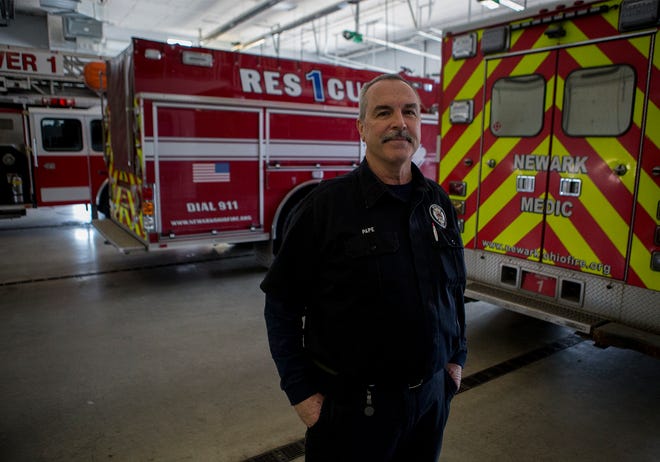 Firefighter Mike Pape retired Monday after 33 years in Newark. 