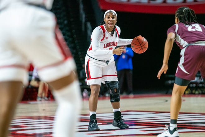 UL's Jasmine Thomas directs her teammates during the play as the Ragin' Cajuns beat the Little Rock Trojans 49-46 at the Cajundome on Wednesday, March 11, 2020.