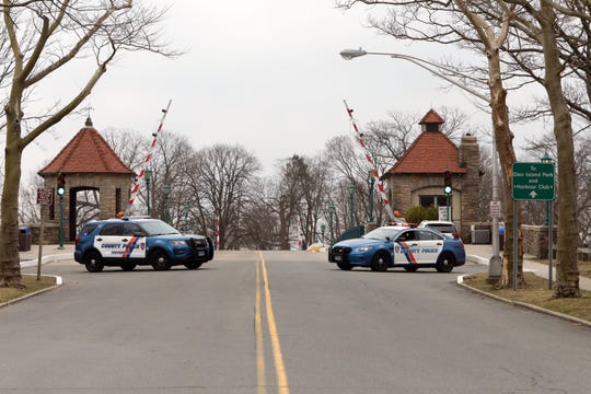 Westchester County Police block the entrance to Glen Island Park in New Rochelle, NY, while preparations are underway to transform the space to a coronavirus testing area March 12, 2020. 
