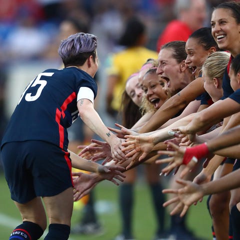 Megan Rapinoe celebrates her first-half goal with 