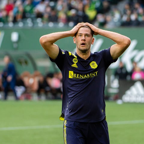 Nashville SC defender Walker Zimmerman reacts afte