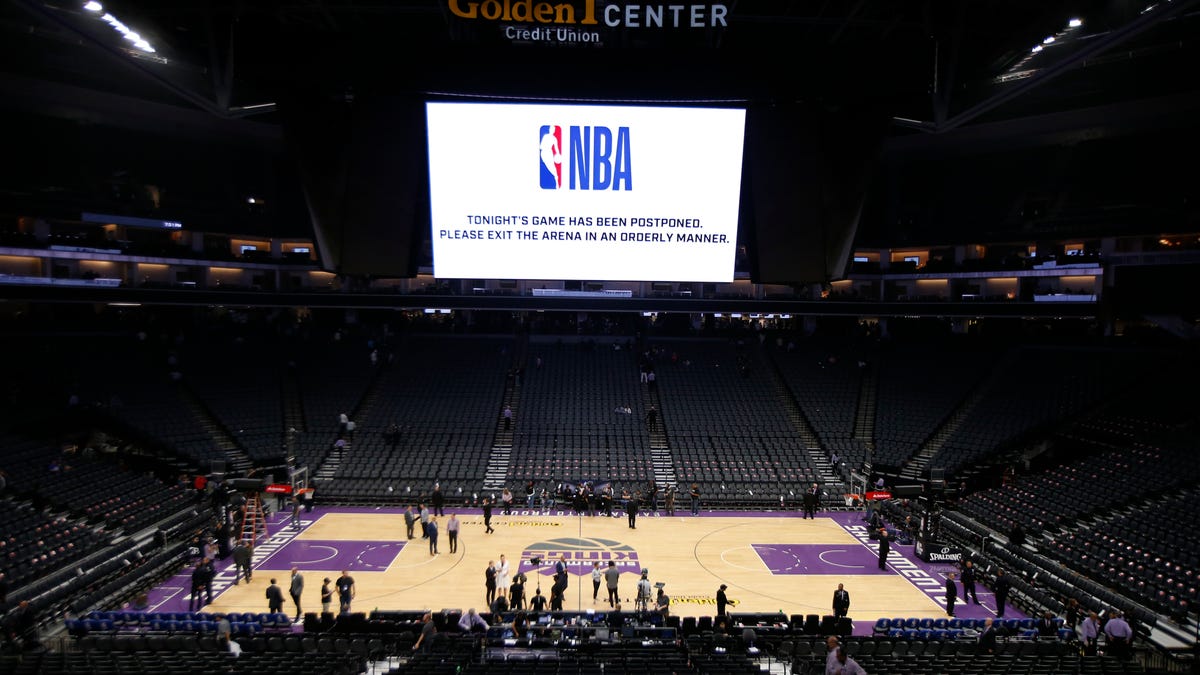 The Golden 1 Center center empties out after the NBA basketball game between the New Orleans Pelicans and Sacramento Kings was postponed at the last minute in Sacramento, Calif., Wednesday, March 11, 2020. The postponement was due to what the league said was an "abundance of caution," because official Courtney Kirkland, who was scheduled to work the game, had worked the Utah Jazz game earlier in the week. A player for   the Jazz tested positive for the coronavirus.