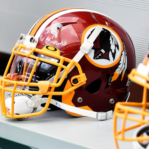Washington Redskins helmets are seen on the bench 
