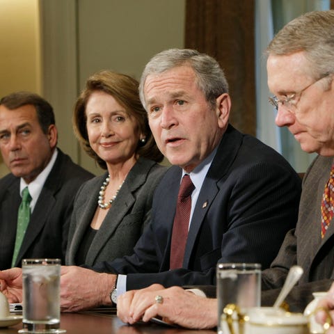 President Bush, second from right, meets with Cong