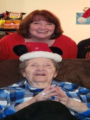 Penny Hamilton of Sterling Heights stands behind her mother Barbara Piotrowski
