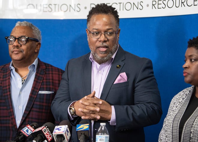 State Representative Antonio Parkinson speaks to reporters during a press conference at Golden Gate Cathedral on Friday, March 13, 2020.