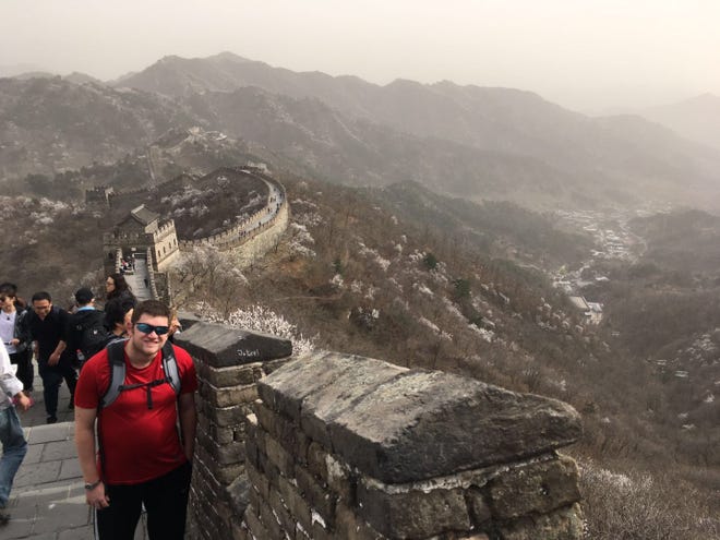 Stephen Johnson, a 2006 Birmingham Groves graduate, has been living in China for the past five years. Here, he visits the Great Wall of China.