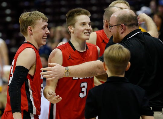 Isaac Haney, of Dora, celebrates during the Falcon's 59-49 win over the St. Elizabeth Hornets to win the Class 1 State Championship at JQH Arena on Friday, March 13, 2020.
