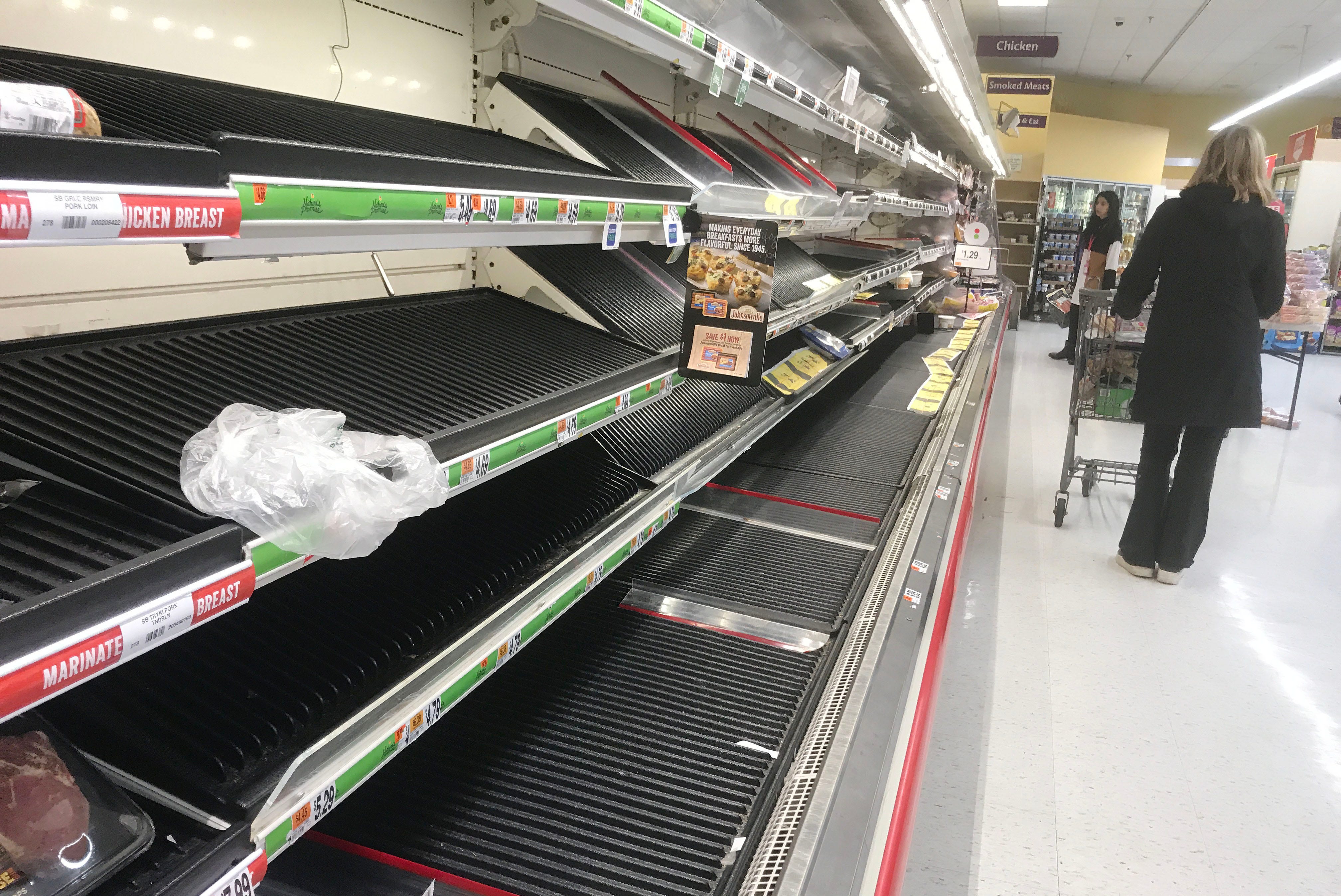 As COVID-19 swept the state and schools and businesses closed their doors, grocery stores scrambled to restock, limiting their hours and putting stockpiling limits on dozens of grocery items to alleviate scenes like this one, where shoppers saw empty meat shelves at the Stop & Shop in Mamaroneck on March 13, 2020.