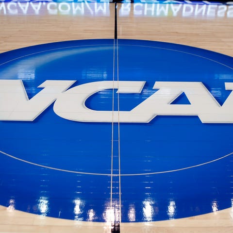 The NCAA logo is displayed at center court as work