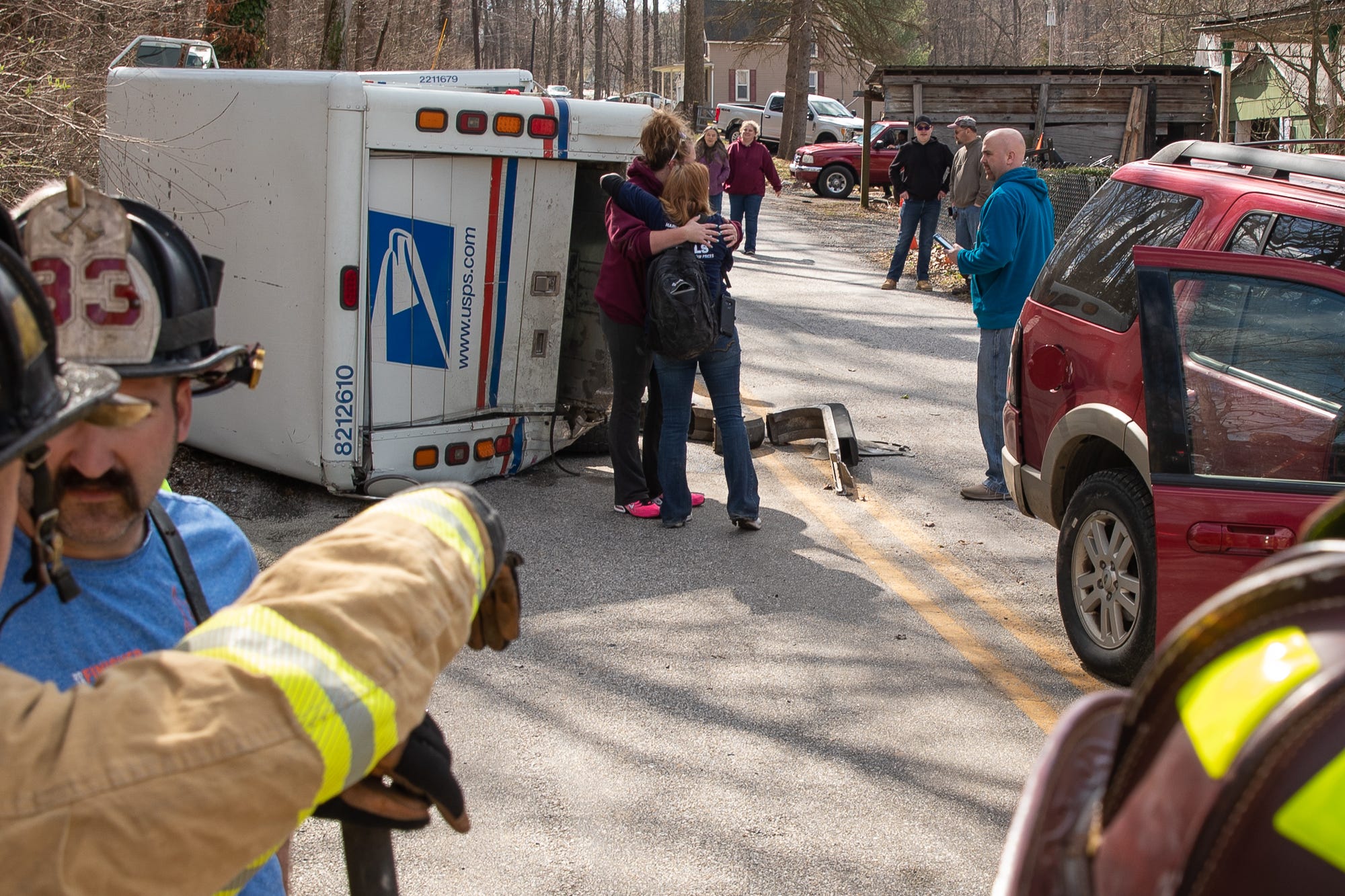 USPS mail truck flipped during crash with SUV in Adams County