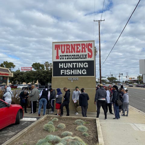 Line outside the Turner's Outdoorsman store