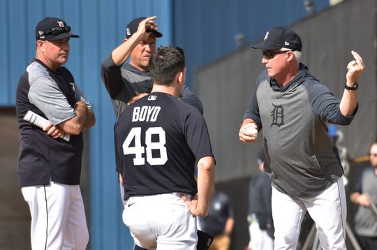 Tigers pitching coach Rick Anderson, right, talks with Matthew Boyd at the first day of pitchers and catchers worked out in Lakeland, Florida.