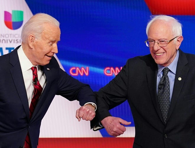 In what may be the final debate of the Democratic primary for 2020 election cycle, Joe Biden and Bernie Sanders bump elbows before facing off in a CNN television studio on March 15.