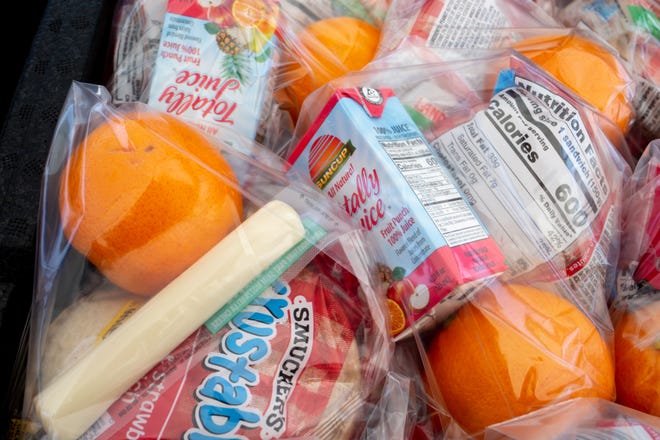 WFISD and school districts across the country are adapting to conditions brought on by the Covid-19 pandemic by offering students meals to go. This is lunch for students on March 16, 2020, at South Mountain High School in Phoenix, Arizona.