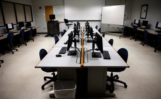 A computer lab on the Angelo State University campus sits empty Tuesday, March 17, 2020 as the college announced the postponement of commencement ceremonies in May.