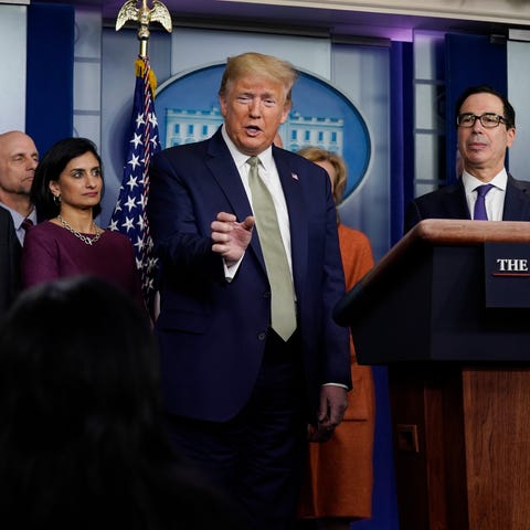President Donald Trump speaks during a press brief