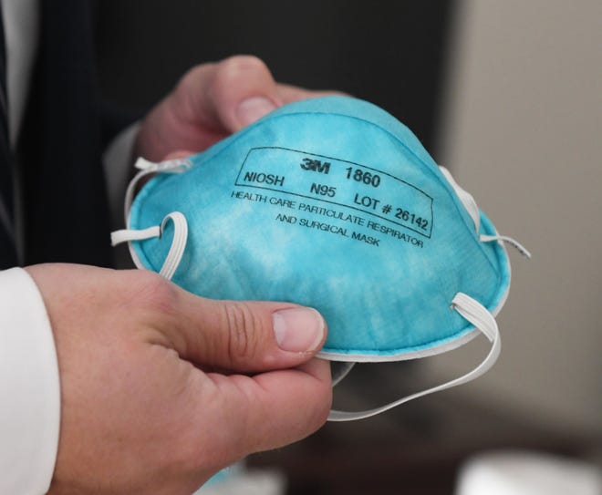 An N95 respirator is a respiratory protective device designed to achieve a very close facial fit and very efficient filtration of airborne particles, accoding to the Food and Drug Administration.