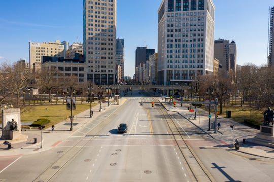 At 4:30 p.m. March 17, almost one week after the first confirmed cases of coronavirus in Michigan were reported, Woodward Avenue is nearly deserted.