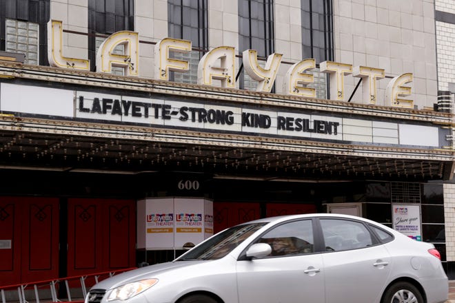 The marquee of the Lafayette Theater reads "Lafayette - Strong Kind Resilent," Wednesday, March 18, 2020 in Lafayette.