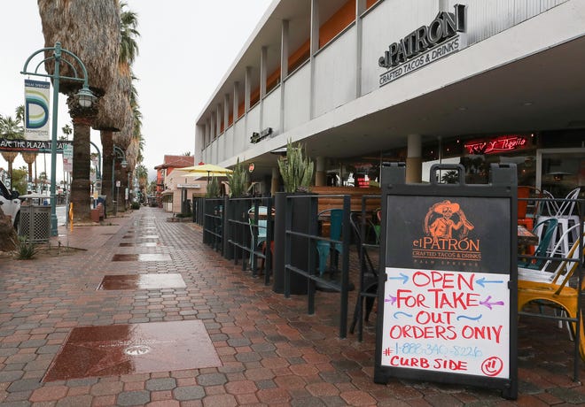 The usually busy downtown Palm Springs was mostly devoid of people as the coronavirus forces people to stay home and businesses to close, March 18, 2020.