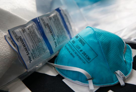 A N95 particulate respirator and sanitizing supplies at the home of Christine MacNeil, a registered nurse with the Dutchess County Medical Reserve Corps in Pine Plains on March 18, 2020.  MacNeil is also an instructor at Dutchess County BOCES.