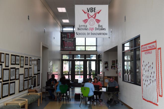 The Indian River County School District began distributing laptops to students on Wednesday, March 18, 2020, at Vero Beach Elementary School in an effort to keep students connected to teachers and assignments during the public schools closure due to the spread of the COVID-19 virus.