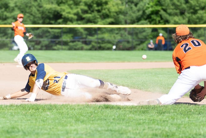 Hartland's Logan Tobel slides safely into third base on Monday, June 3, 2019. Baseball and other spring sports are on hold because of school closings due to the coronavirus.