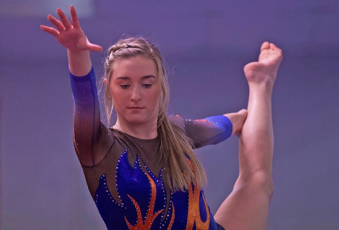 Valyssa Hartman performs on the balance beam during a meet at San Angelo Central High School on Thursday, March 5, 2020.