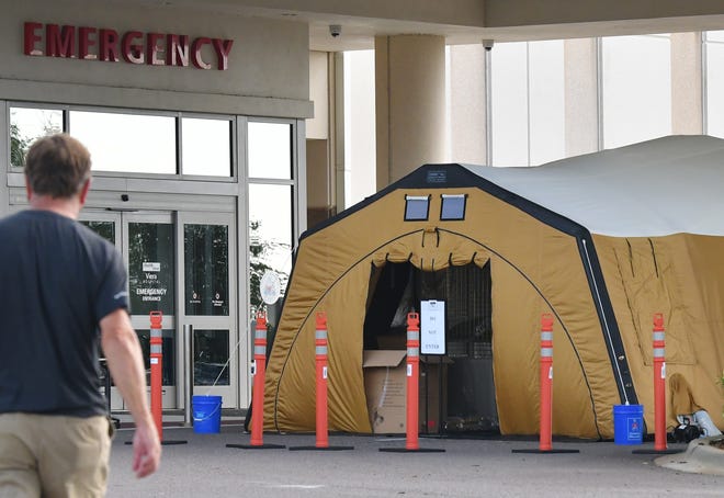  As a precaution, per state and CDC guidelines, Health First has set up triage tents outside all four of their hospitals in Brevard, including this one at their Viera Hospital. As of Thursday, March 19, these tents are not being used for patient care, but are in place in case of a surge of patients who display symptoms of COVID-19.
