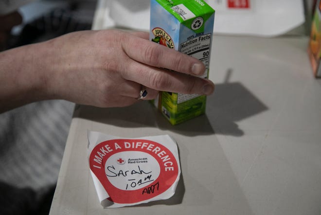 Sarah Previch, 37, of Ferndale signed up to donate blood Thursday, March, 19, 2020 at the Pleasant Ridge Community Center in Pleasant Ridge.