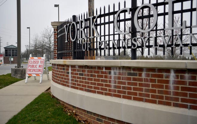 Signs block the entrances to York College, Thursday, March 19, 2020.John A. Pavoncello photo