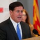 Gov. Doug Ducey gives an update on COVID-19 during a news conference at the Arizona State Public Health Laboratory in Phoenix March 23, 2020.