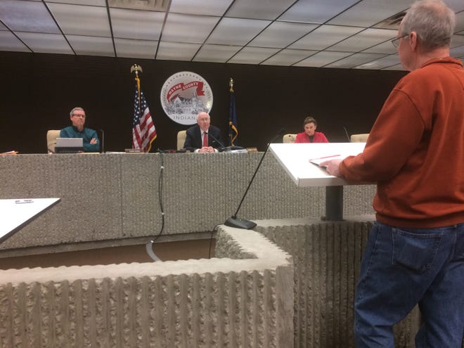 Rich Rankin of the county's IT department speaks to Wayne County Board of Commissioners members Denny Burns (from left), Ken Paust and Mary Anne Butters during a Monday, March 23, 2020, meeting inside the Wayne County Government Annex building.