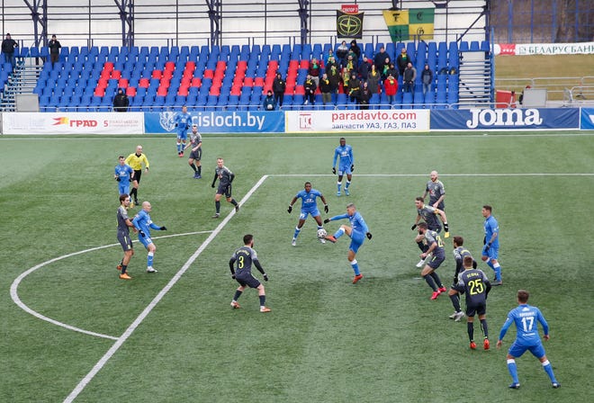 Players in action during the Belarusian Premier League soccer match between Isloch and Neman Grodno in Minsk, Belarus, March 21, 2020. Belarus didn't suspend soccer games, as most of European countries due to the coronavirus COVID19 pandemic. Belarus plans to hold all soccer matches, as scheduled, local media reports.