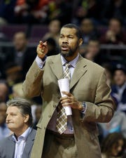 Former Pistons forward Rasheed Wallace, shown here coaching from the Pistons bench in 2014, is coaching a high school boys basketball team in North Carolina.
