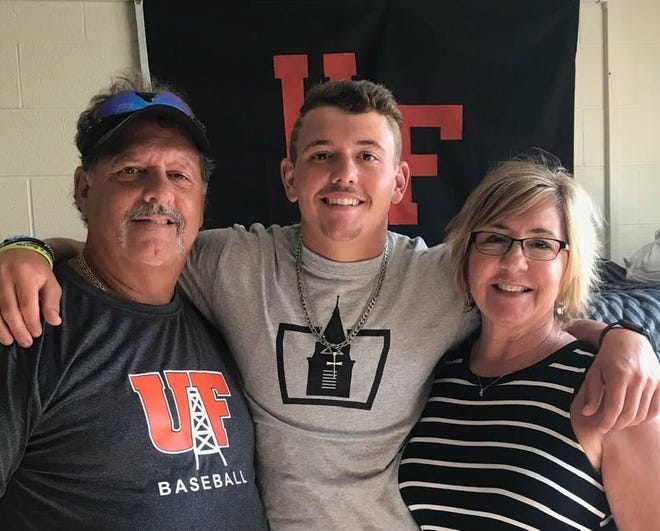 Clyde's Cam Farrar first learned his baseball season at the University of Findlay was canceled this year. His day changed when father, Brad Farrar, informed Farrar he was cancer free. They're joined by Farrar's mother, Kimberly.