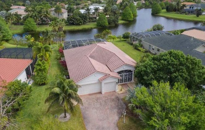 This 2,437-square-foot waterfront in Hammock Creek in Palm City goes up for auction at 6 p.m. Wednesday.