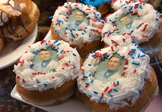 Doughnuts featuring an image of Dr. Anthony Fauci are a new and popular offering from Donuts Delite on Culver Road.