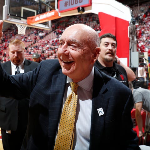 ESPN announcer Dick Vitale points to the fans befo