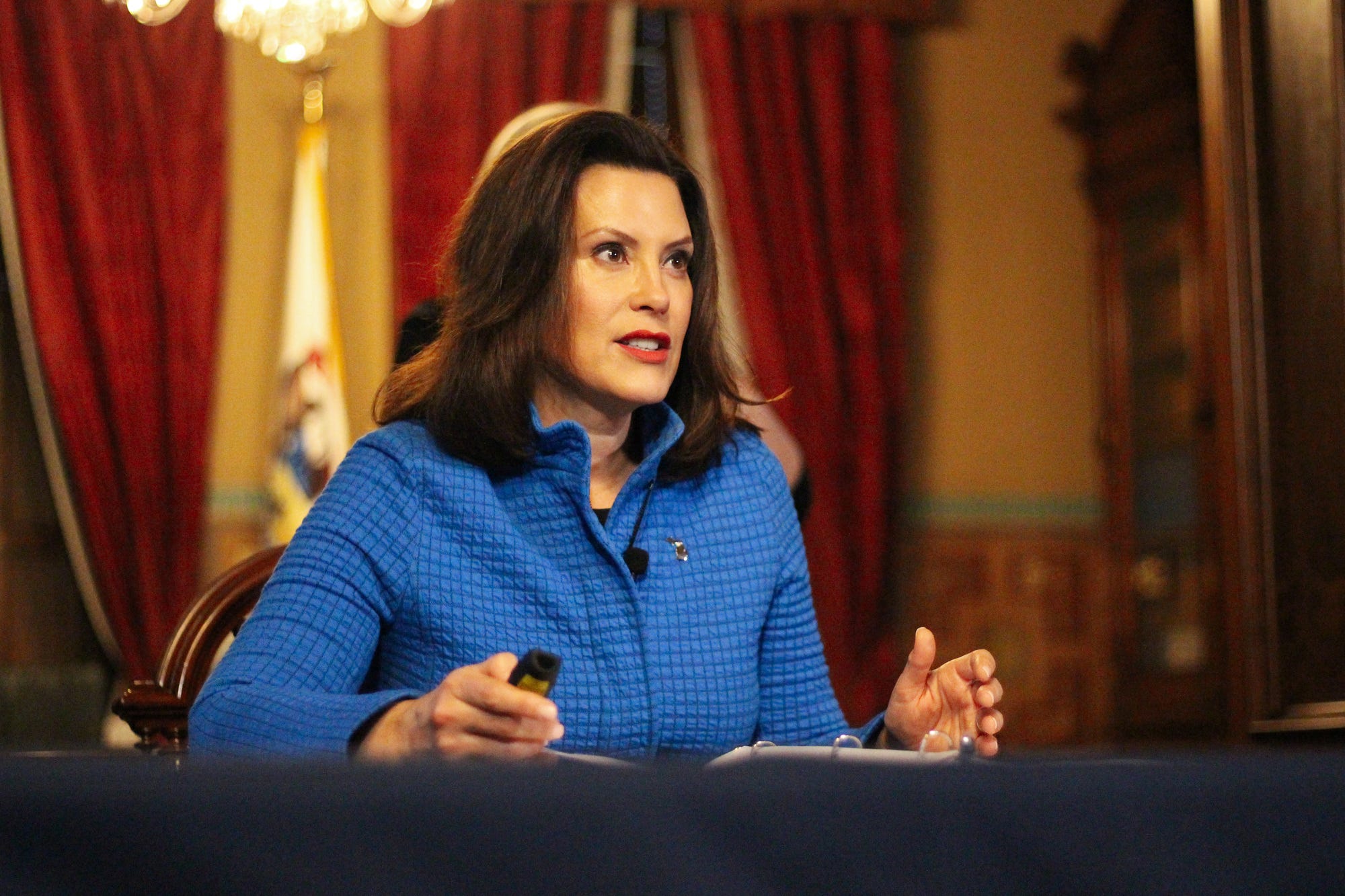 Gov. Gretchen Whitmer is seen here giving an update on the COVID-19 pandemic during a March 2020 press conference inside her Capitol office. The governor's order that COVID patients remain inside long-term care facilities drew criticism during the early days of the pandemic.