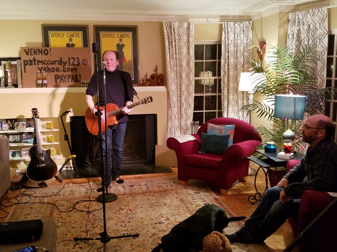 Pat McCurdy performed an online concert for the first time from his living room March 20. With bars, clubs and theaters closed indefinitely due to the coronavirus, several Milwaukee musicians are performing concerts online to make some money.